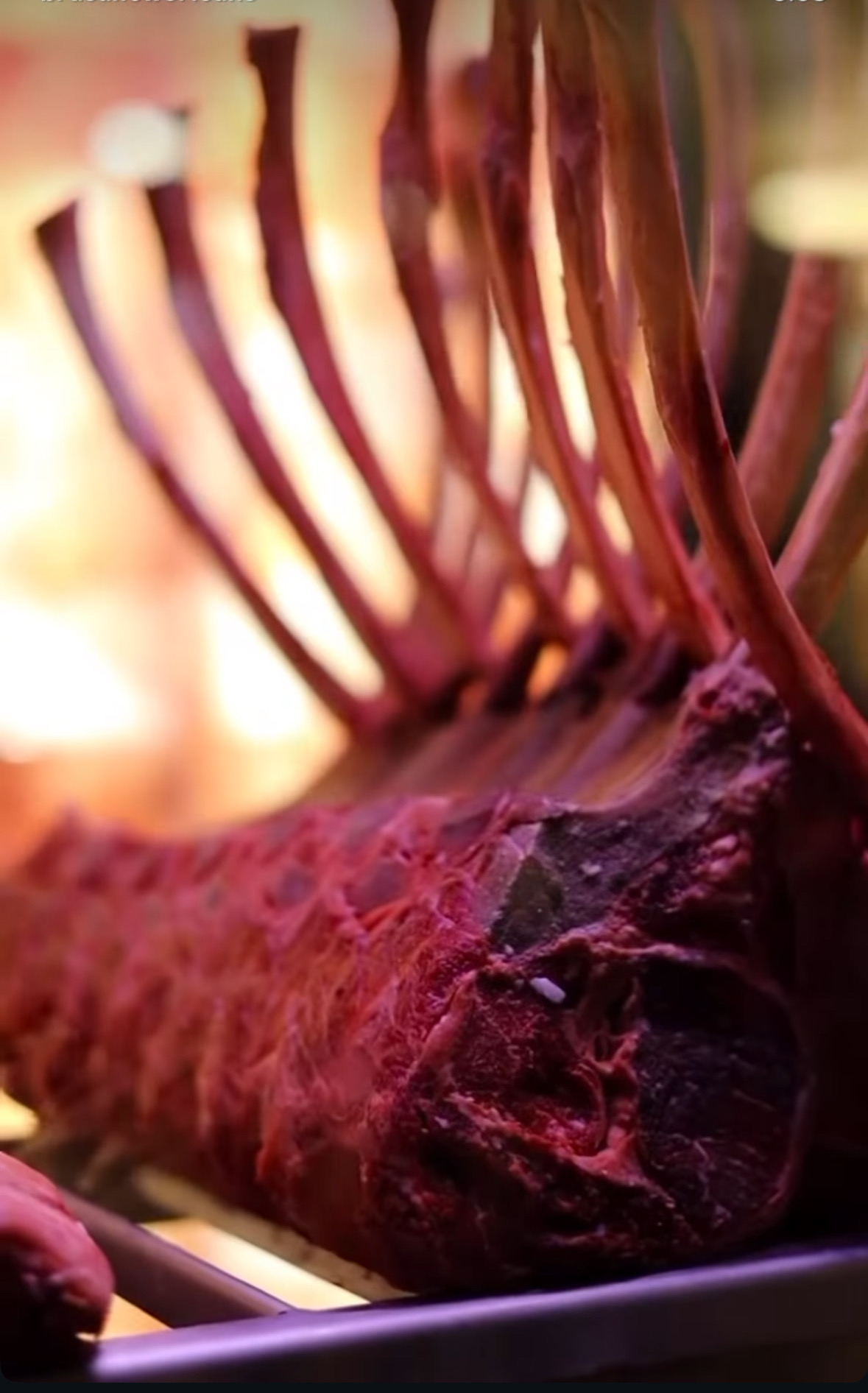 Dry-aged beef rib rack developing flavor and tenderness through open-air aging